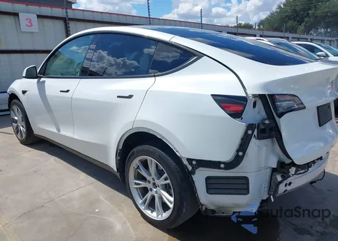 2023 Tesla Model Y Awd/Long Range Dual Motor All-Wheel Drive z USA, uszkodzony, nr VIN 7SAYGDEE6PA078790